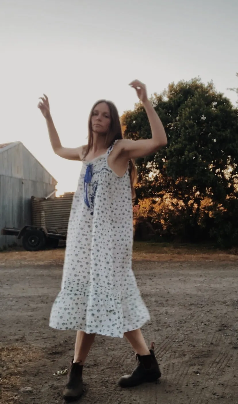 100% RECYCLED COTTON - NIGHTINGALE HAND SMOCKED MIDI DRESS BLUE ROSE FLORAL