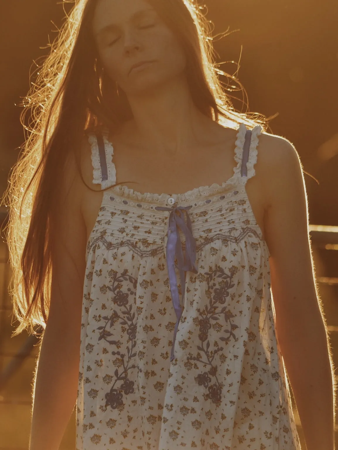 100% RECYCLED COTTON - NIGHTINGALE HAND SMOCKED MIDI DRESS BLUE ROSE FLORAL