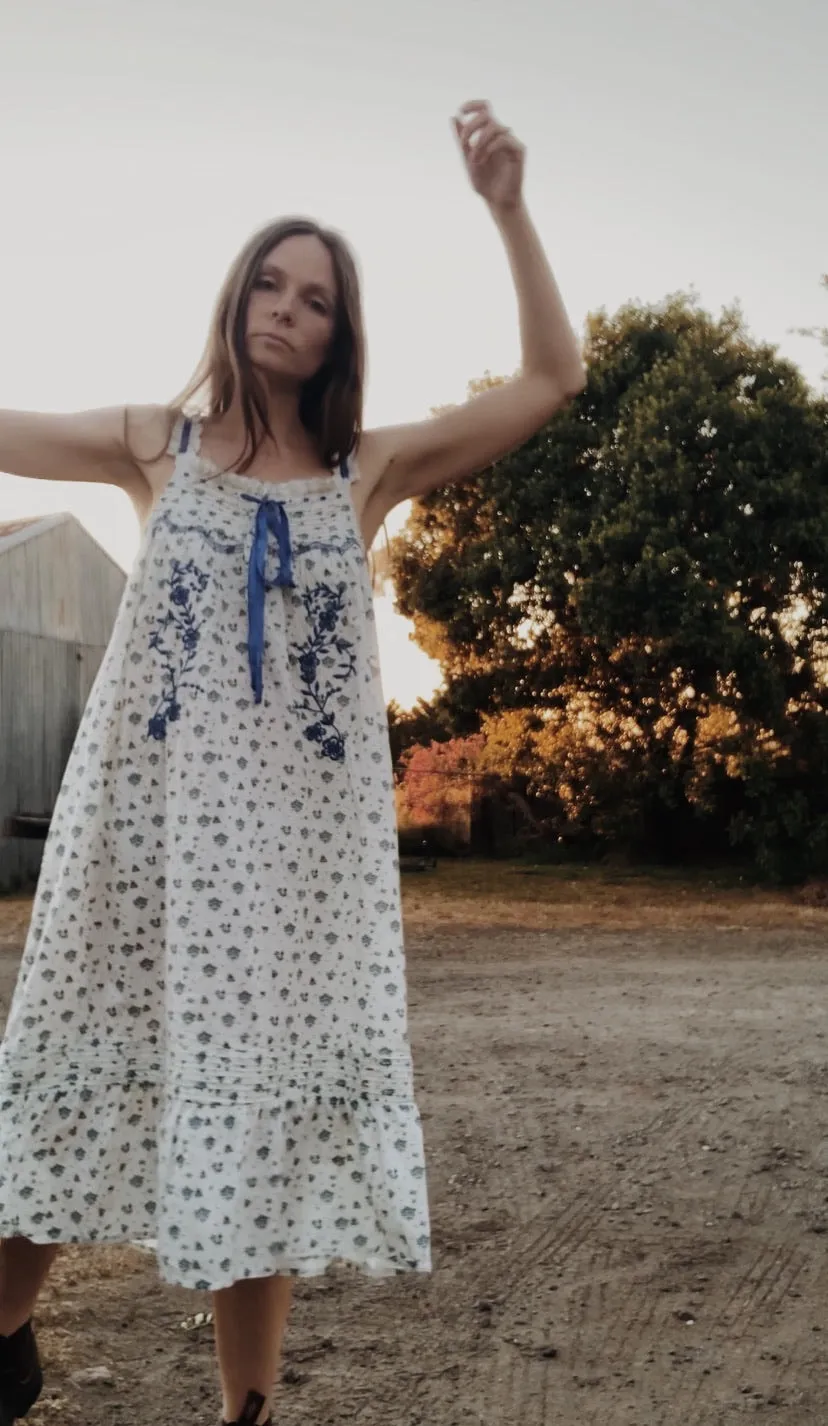 100% RECYCLED COTTON - NIGHTINGALE HAND SMOCKED MIDI DRESS BLUE ROSE FLORAL