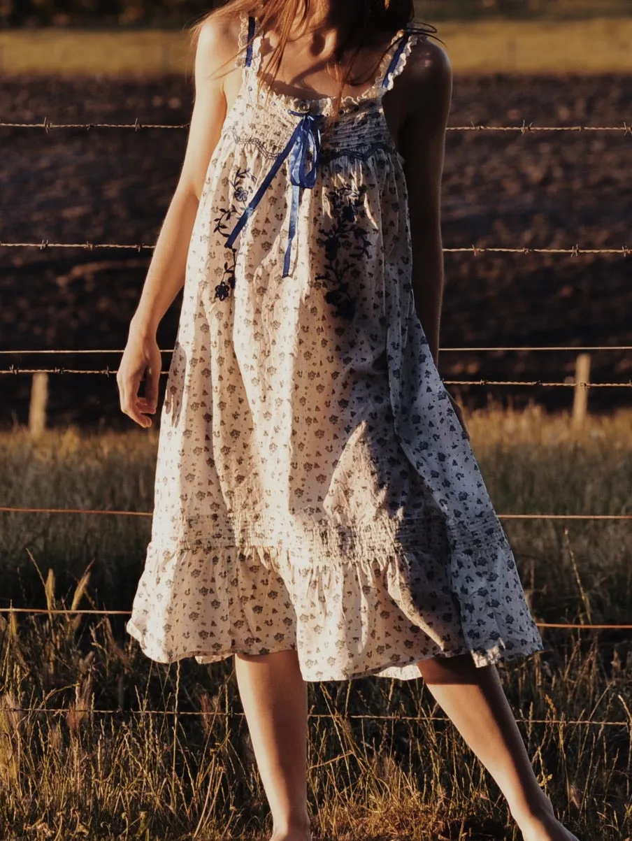100% RECYCLED COTTON - NIGHTINGALE HAND SMOCKED MIDI DRESS BLUE ROSE FLORAL