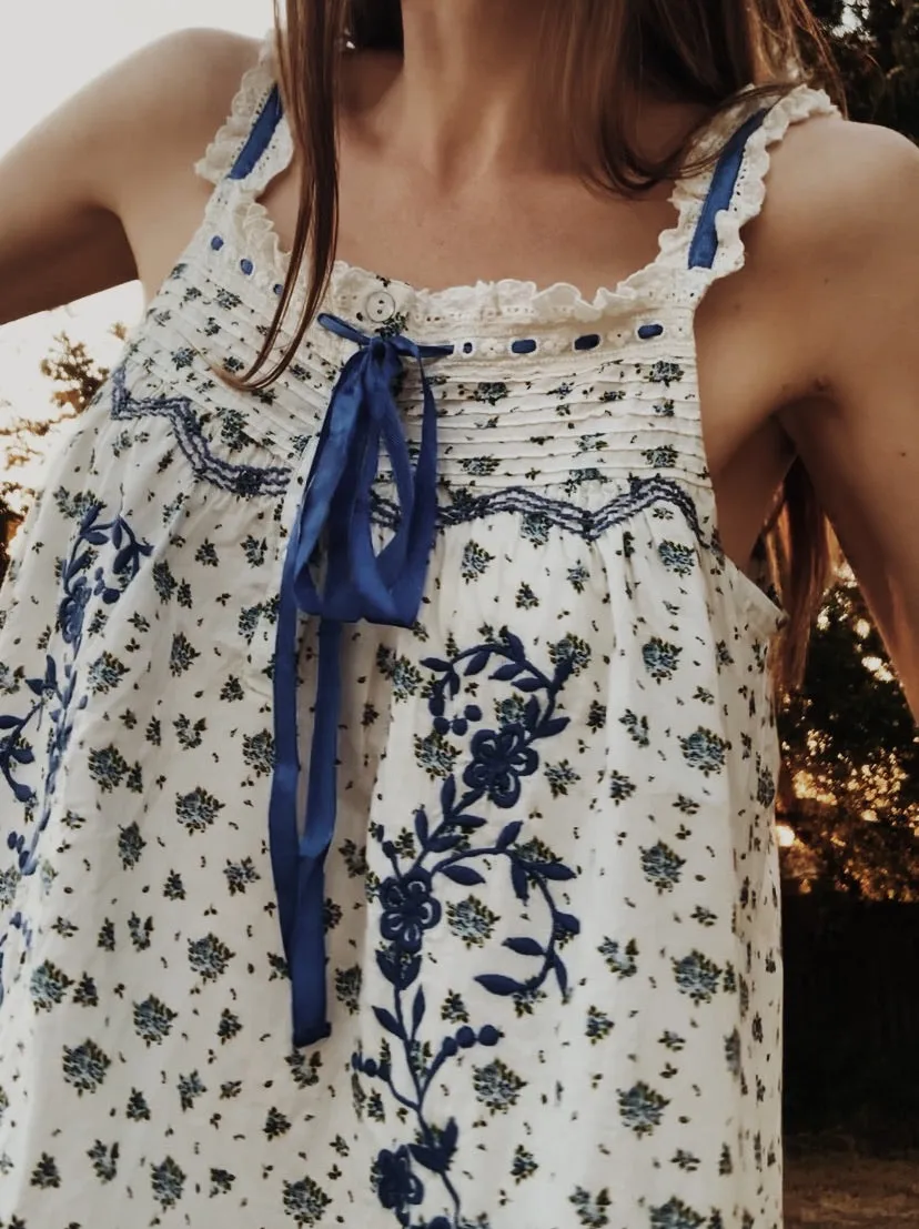 100% RECYCLED COTTON - NIGHTINGALE HAND SMOCKED MIDI DRESS BLUE ROSE FLORAL