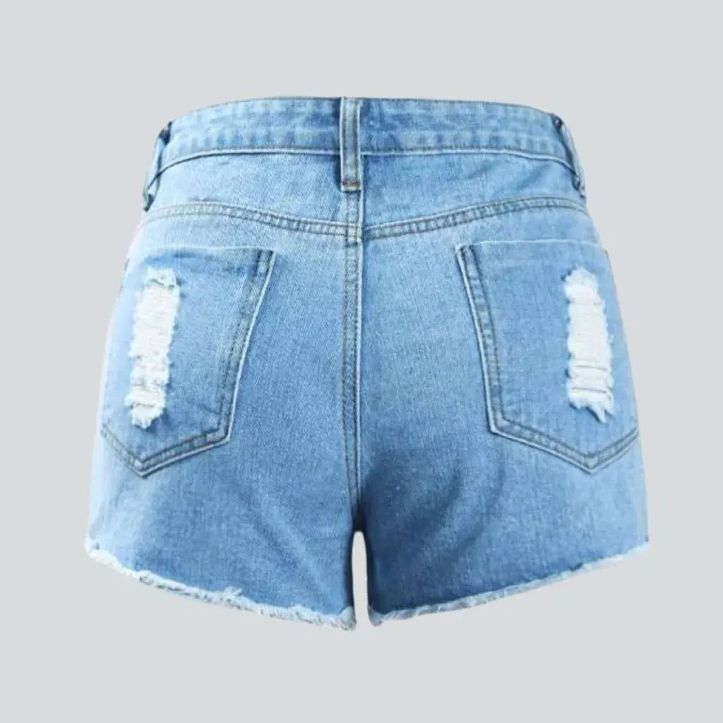 Skinny women's distressed denim shorts