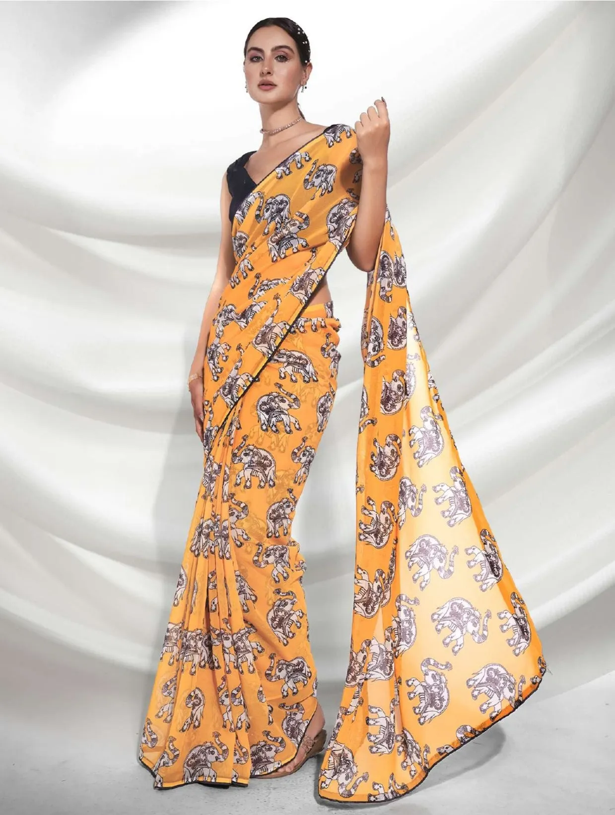 Women Party Wear Elephant Digital Printed Yellow Colour Weightless Saree Collection