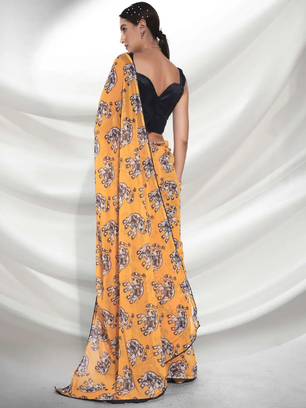 Women Party Wear Elephant Digital Printed Yellow Colour Weightless Saree Collection